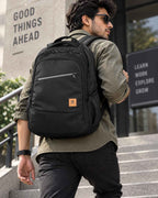 Man wearing Segna waterproof laptop backpack for daily commute